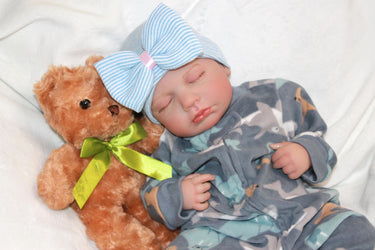 A cute baby in a bow, cuddling a teddy bear, embodying warmth and playfulness.